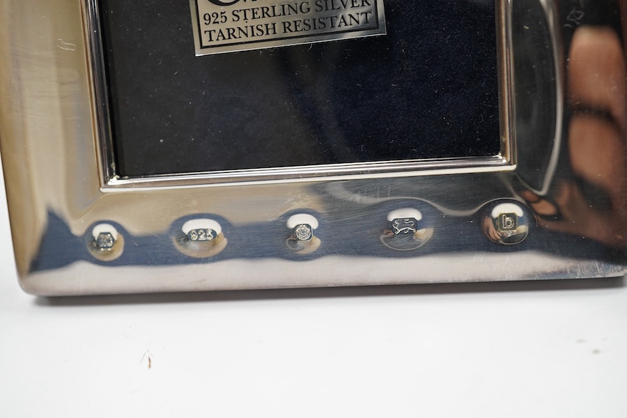 A modern boxed Carr's of Sheffield, silver mounted double photograph frame, width 18.3cm, together with two other silver mounted photograph frames and an Italian silver plated frame. Condition - good